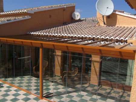 Glass Curtains and Roof installation in Calpe. (using tinted glass)