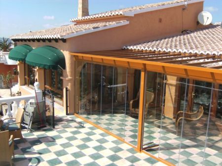 Glass Curtains and Roof installation in Calpe. (using tinted glass)